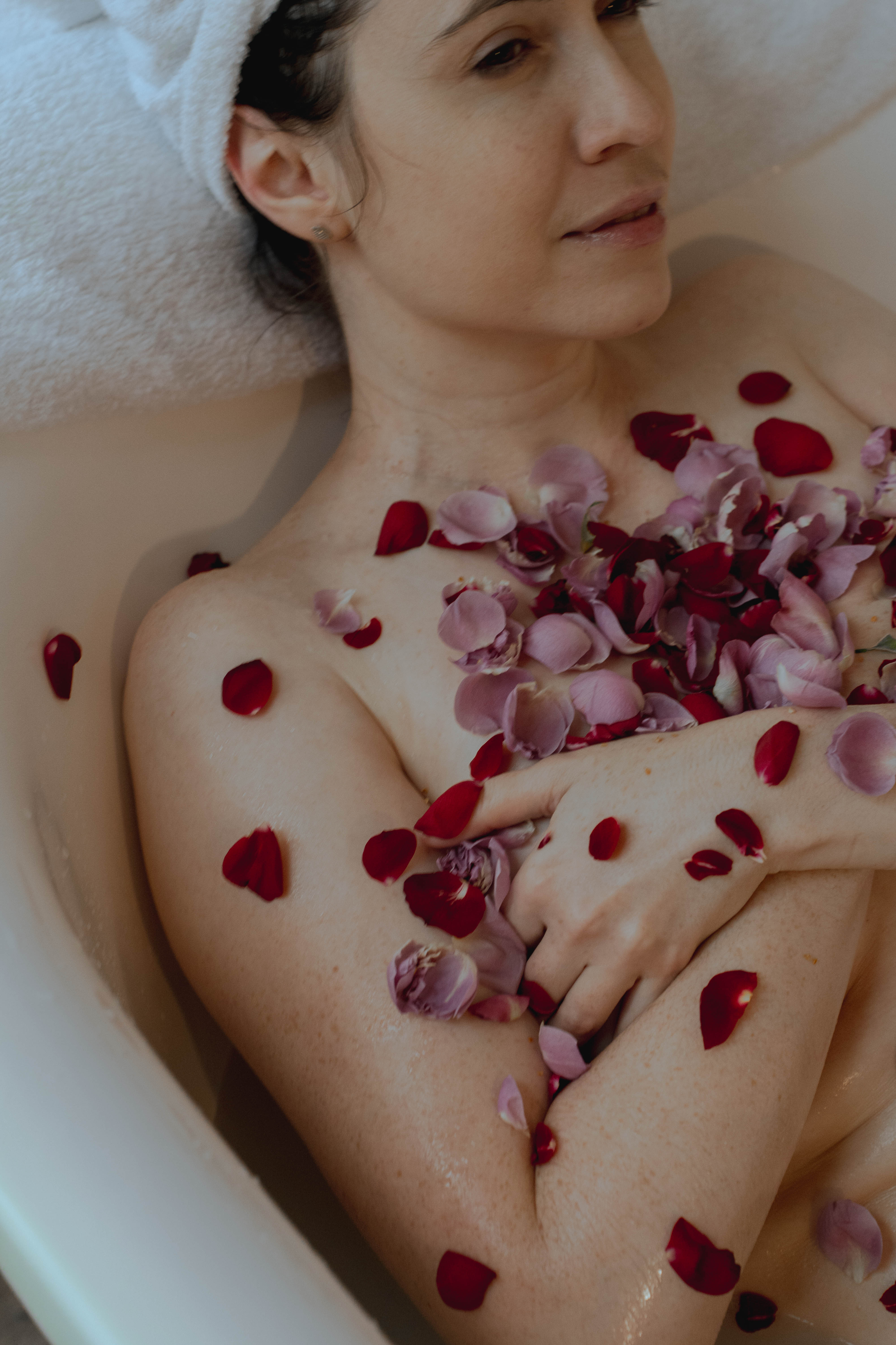 Spa wellness treatment setup with natural products and candles